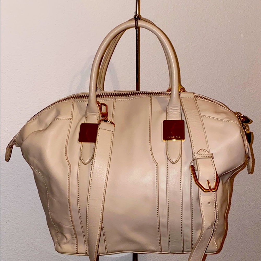 Leather cross body bag comes with dust bag